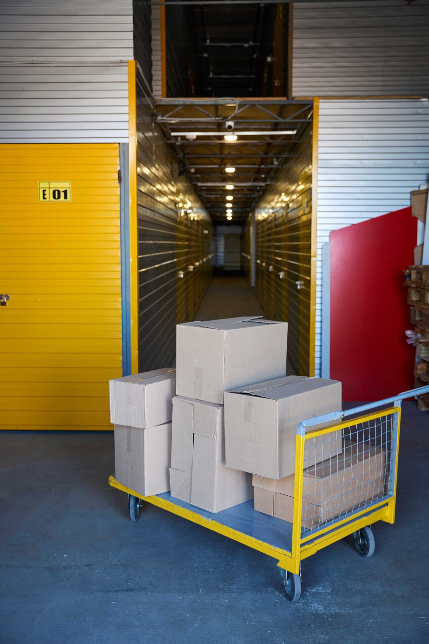 cargo-trolley-on-small-wheels-stands-near-the-cont-2025-03-08-19-49-38-utc (2) | Best Dubai Storage self storage Dubai Self storage in dubai storage dubai