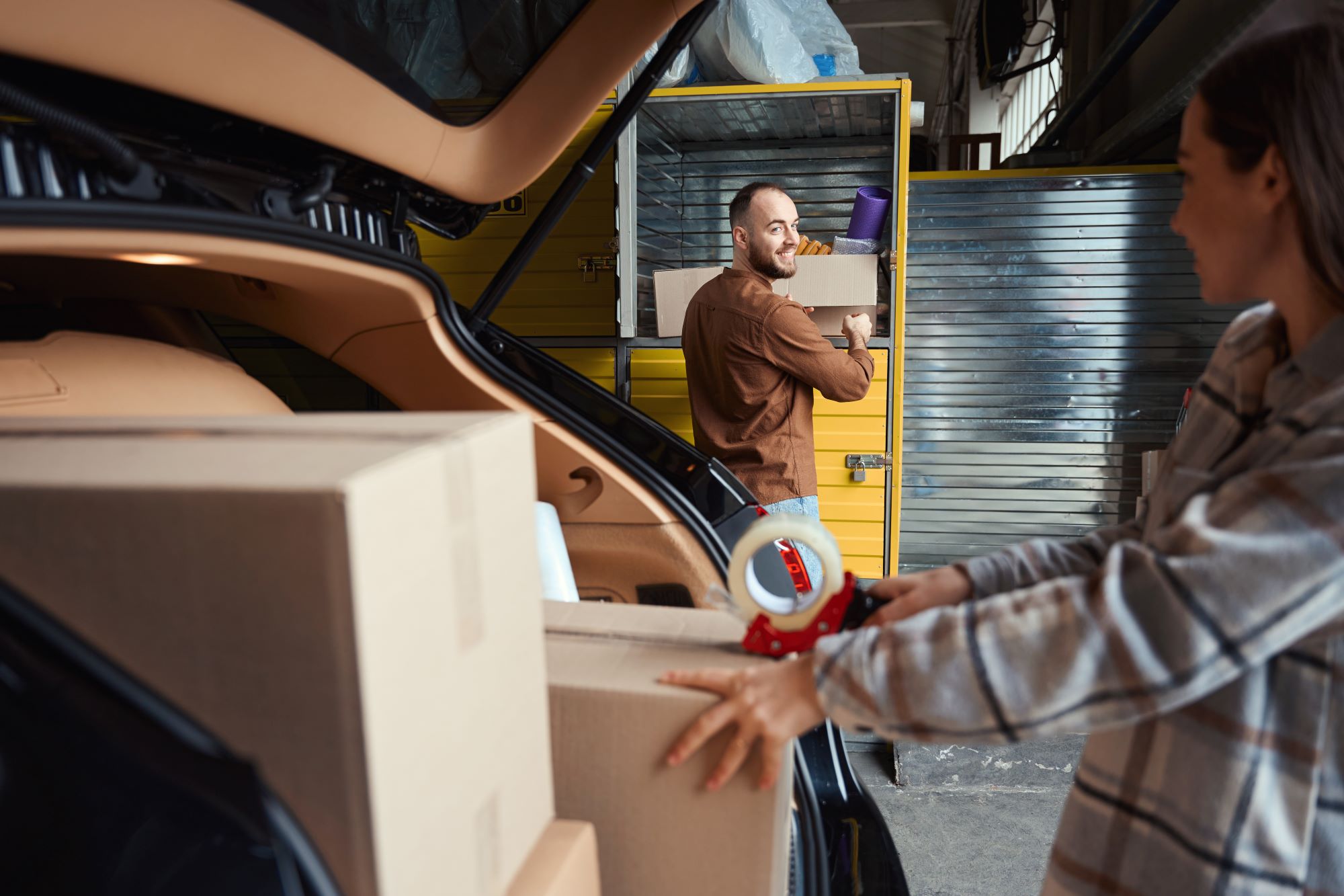 young-happy-man-looking-at-woman-in-a-storage-room-2024-10-22-13-16-45-utc (2) | Best Dubai Storage storage
