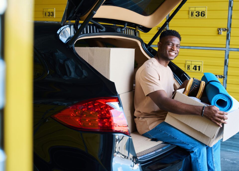 african-american-man-with-box-sitting-on-edge-of-t-2024-10-18-10-03-37-utc 2 | Best Dubai Storage Palm Jumeirah