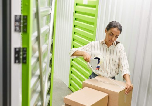 woman-packing-boxes-in-storage-facility-2026-01-08-07-07-09-utc-2.jpg